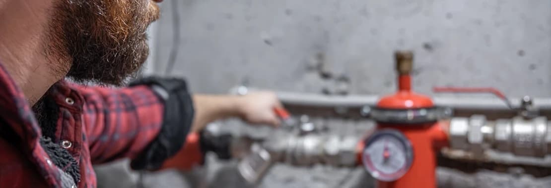man looks faucet pipes convert